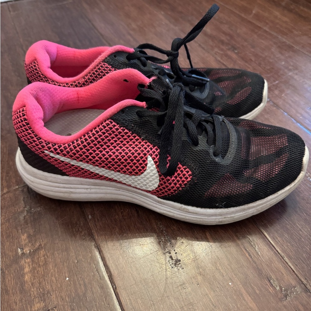 Nike Black and Pink Athletic Shoes with Mesh Upper